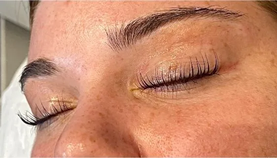 Laminated, tinted brows and lifted lashes