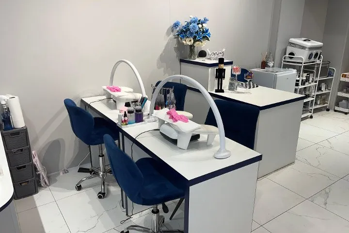 A nail station at Luxxe Beauty