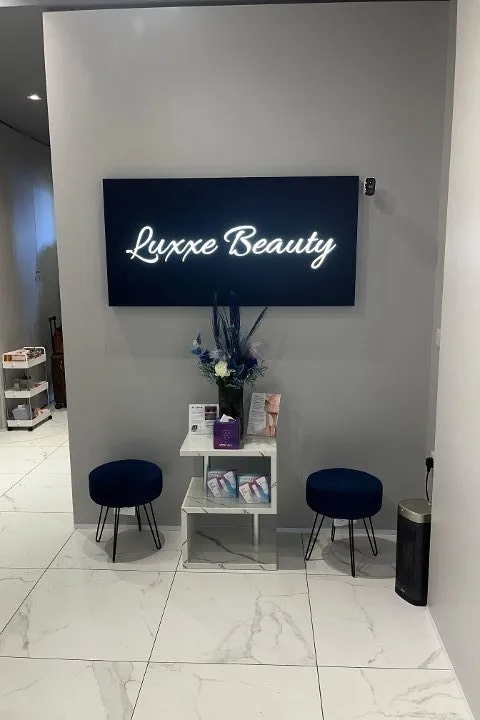 The welcome desk at Luxxe Beauty