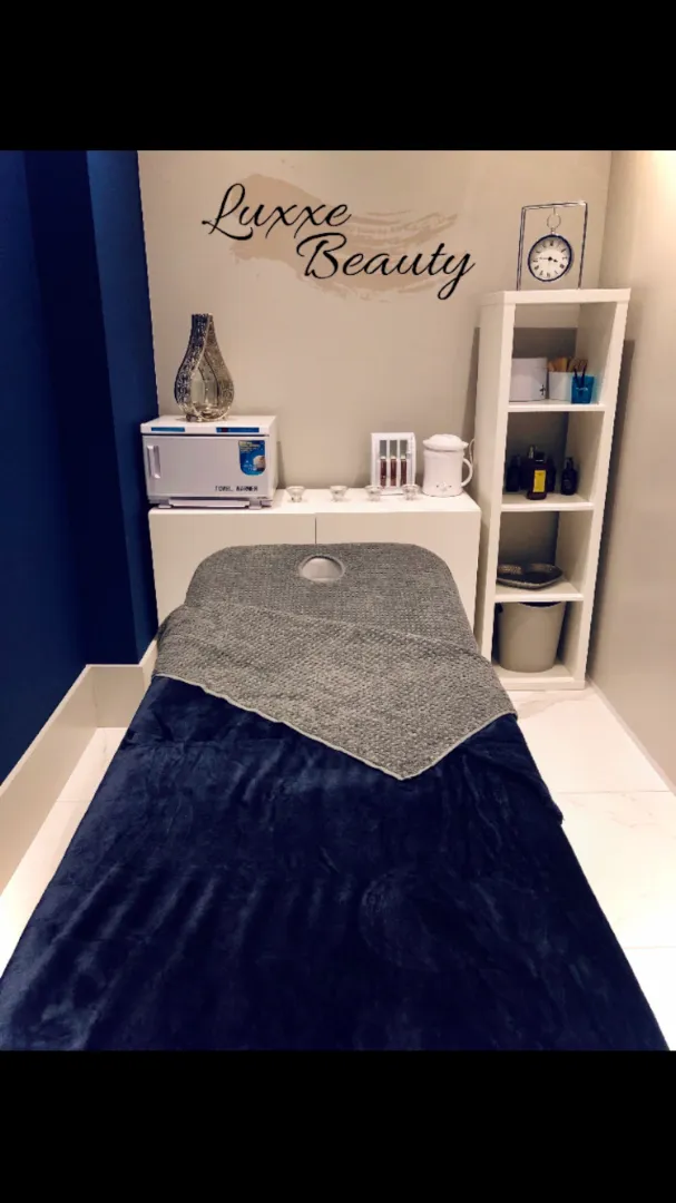 A calm treatment room at Luxxe Beauty